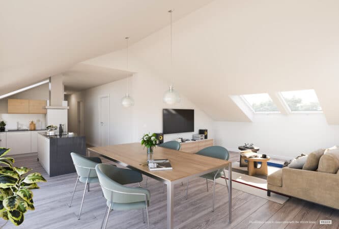 Espace de vie mansardé avec plafond incliné et fenêtres de toit VELUX, mobilier moderne.