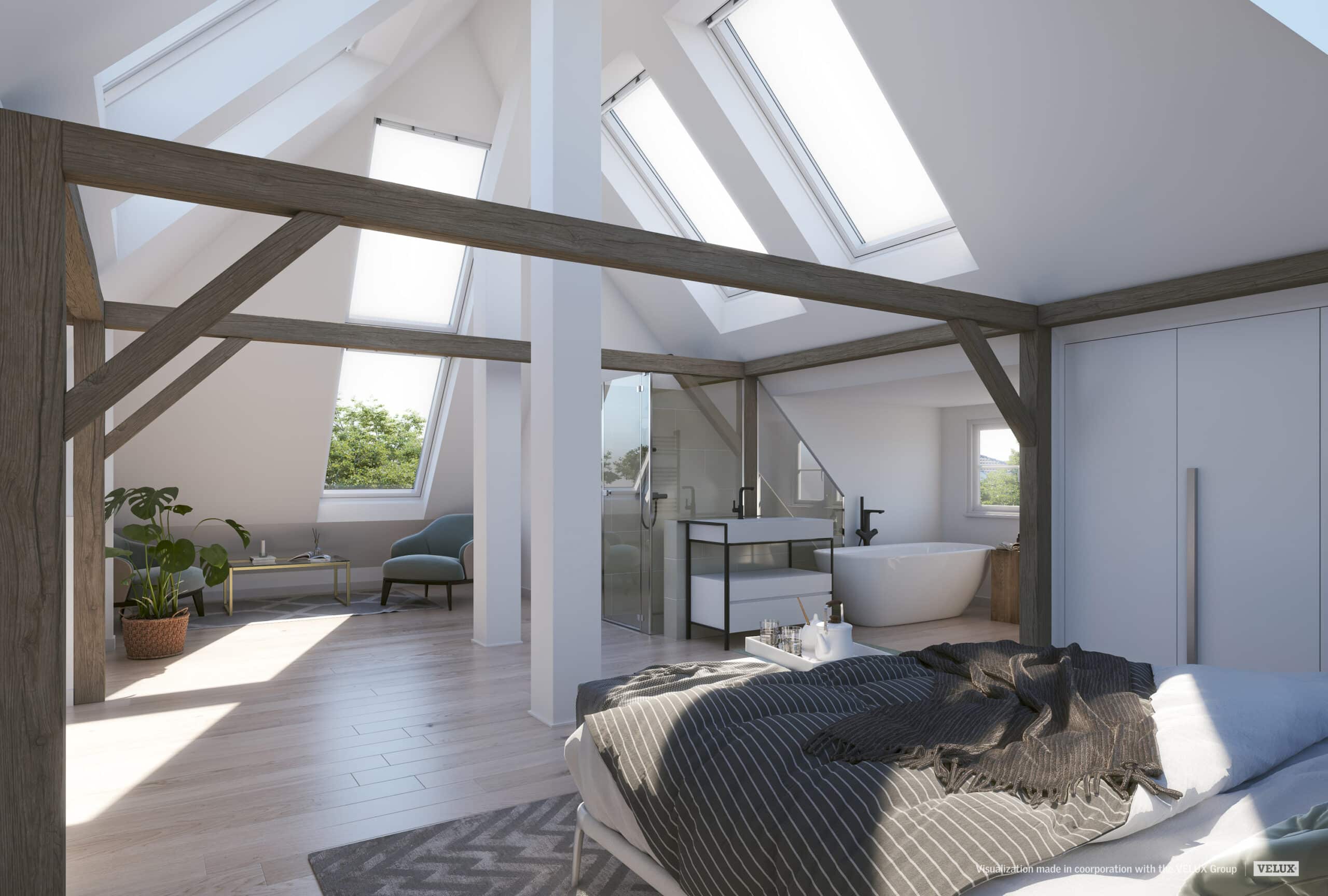 Studio mansard&eacute; sous les combles avec fen&ecirc;tres de toit VELUX, mobilier moderne et lumi&egrave;re naturelle.
