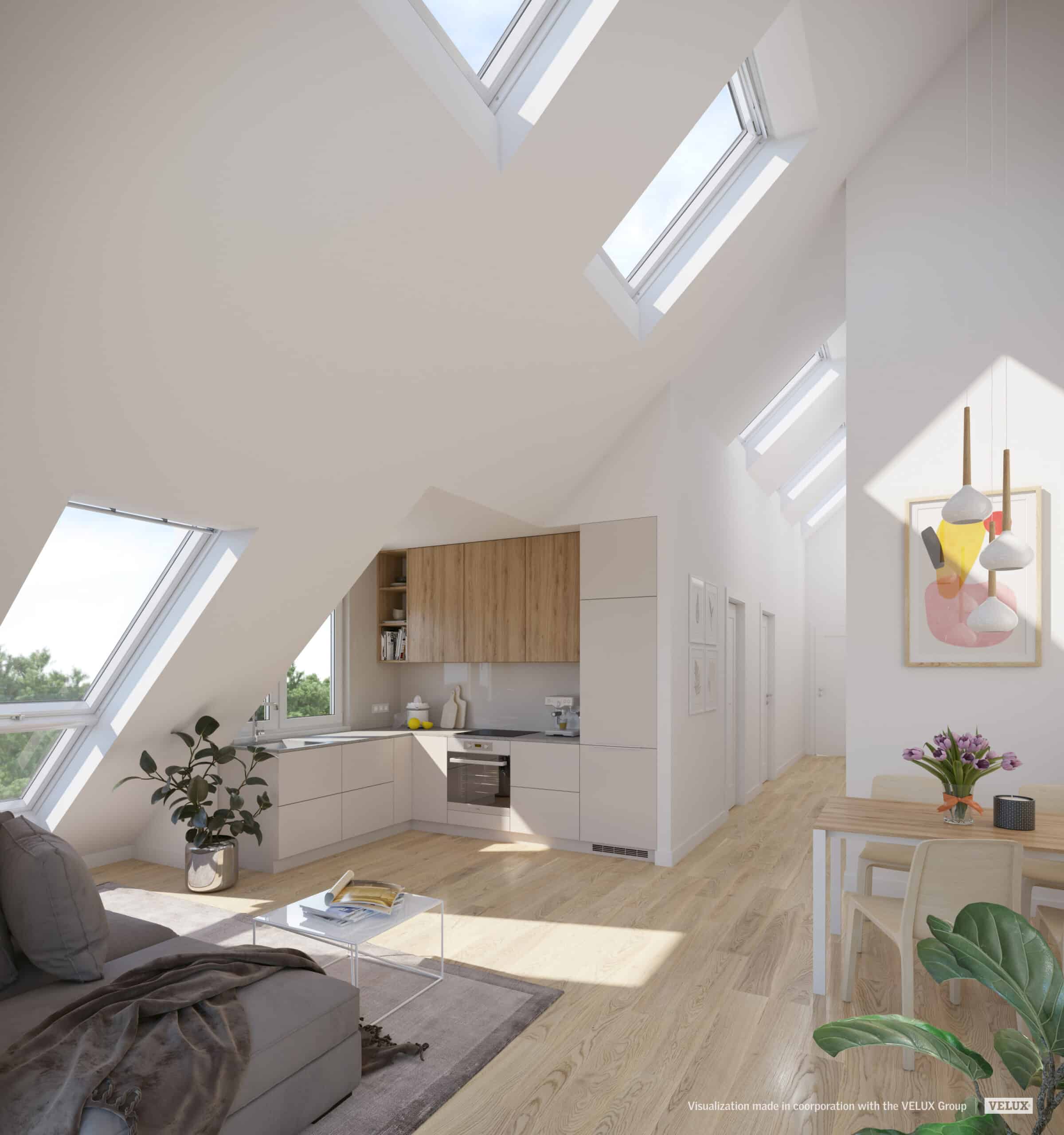 Appartement mansard&eacute; sous combles avec plafond en pente et fen&ecirc;tres de toit VELUX, lumineux et moderne.