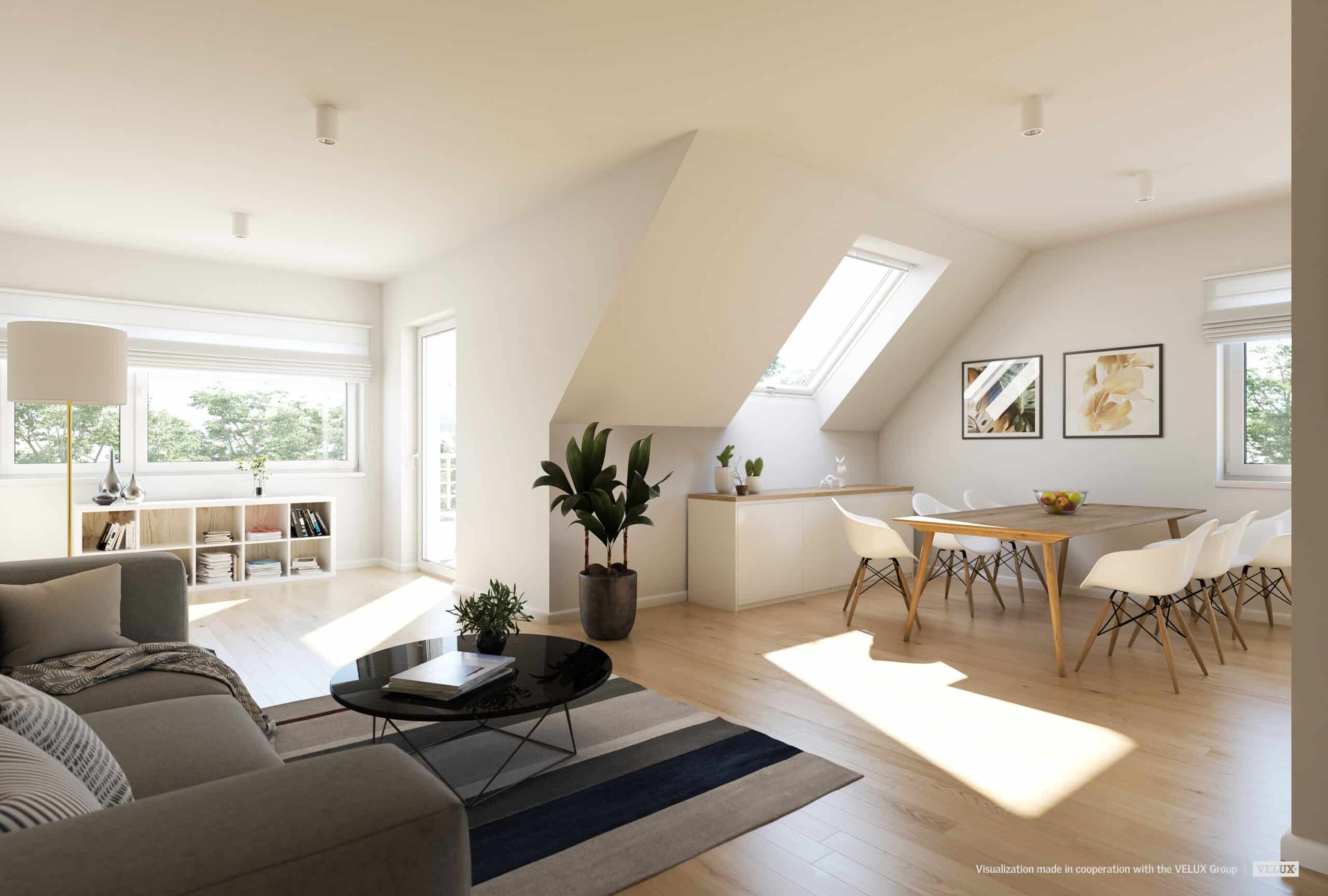 Espace de vie sous combles avec plafond en pente et fen&ecirc;tre de toit VELUX, d&eacute;coration moderne.