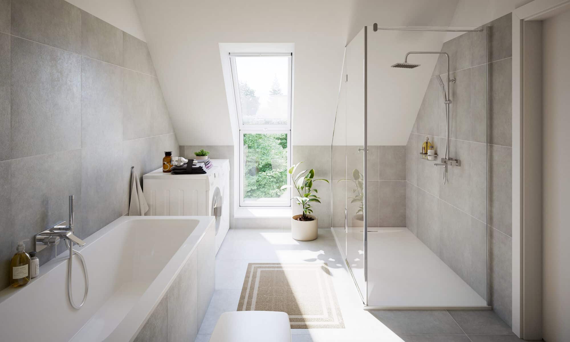 Salle de bain avec plafond en pente et fenêtre de toit VELUX, équipements modernes.