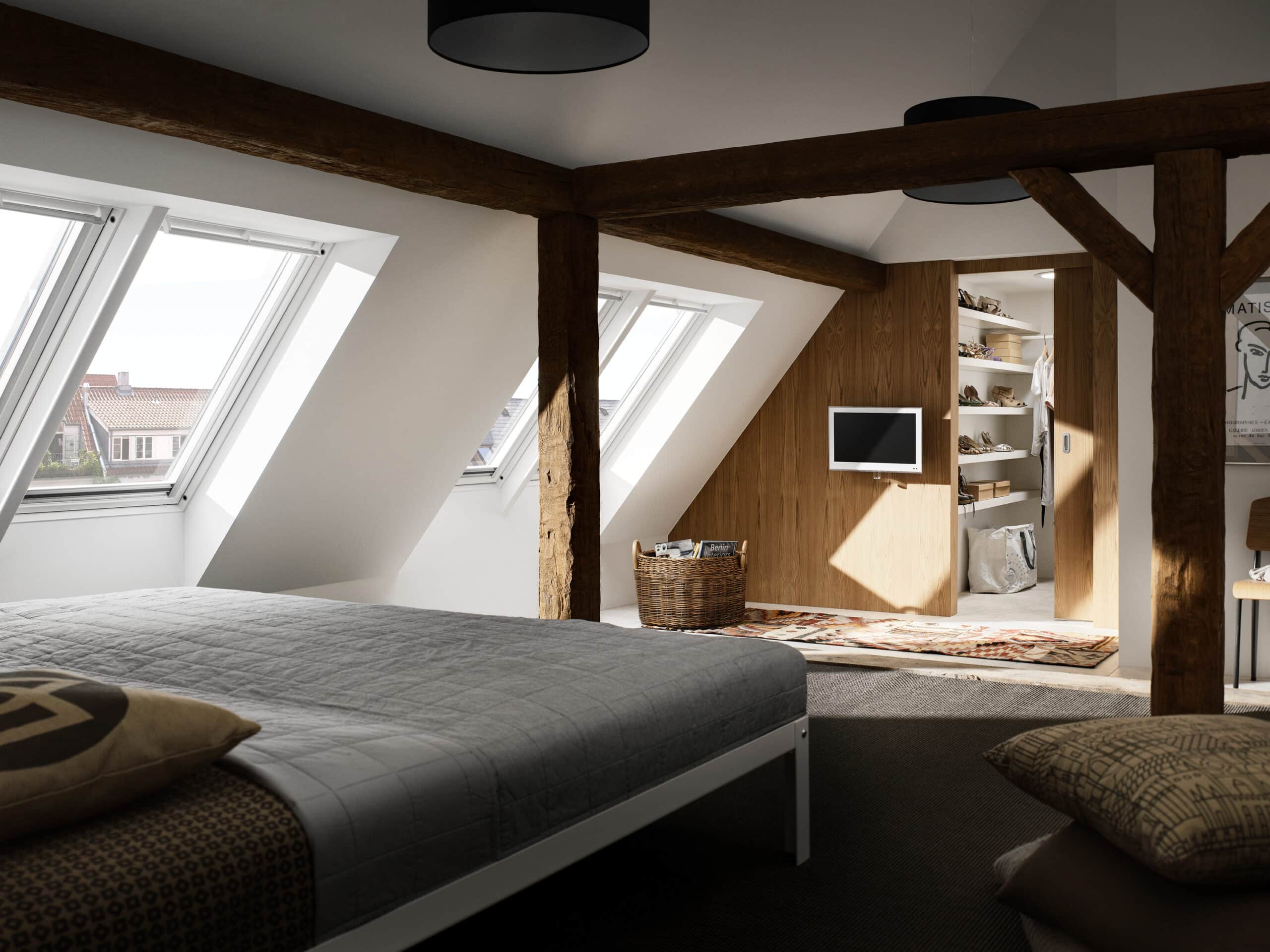 Suite parentale sous combles avec plafond en pente, fen&ecirc;tres de toit (Velux) poutres apparentes et dressing.