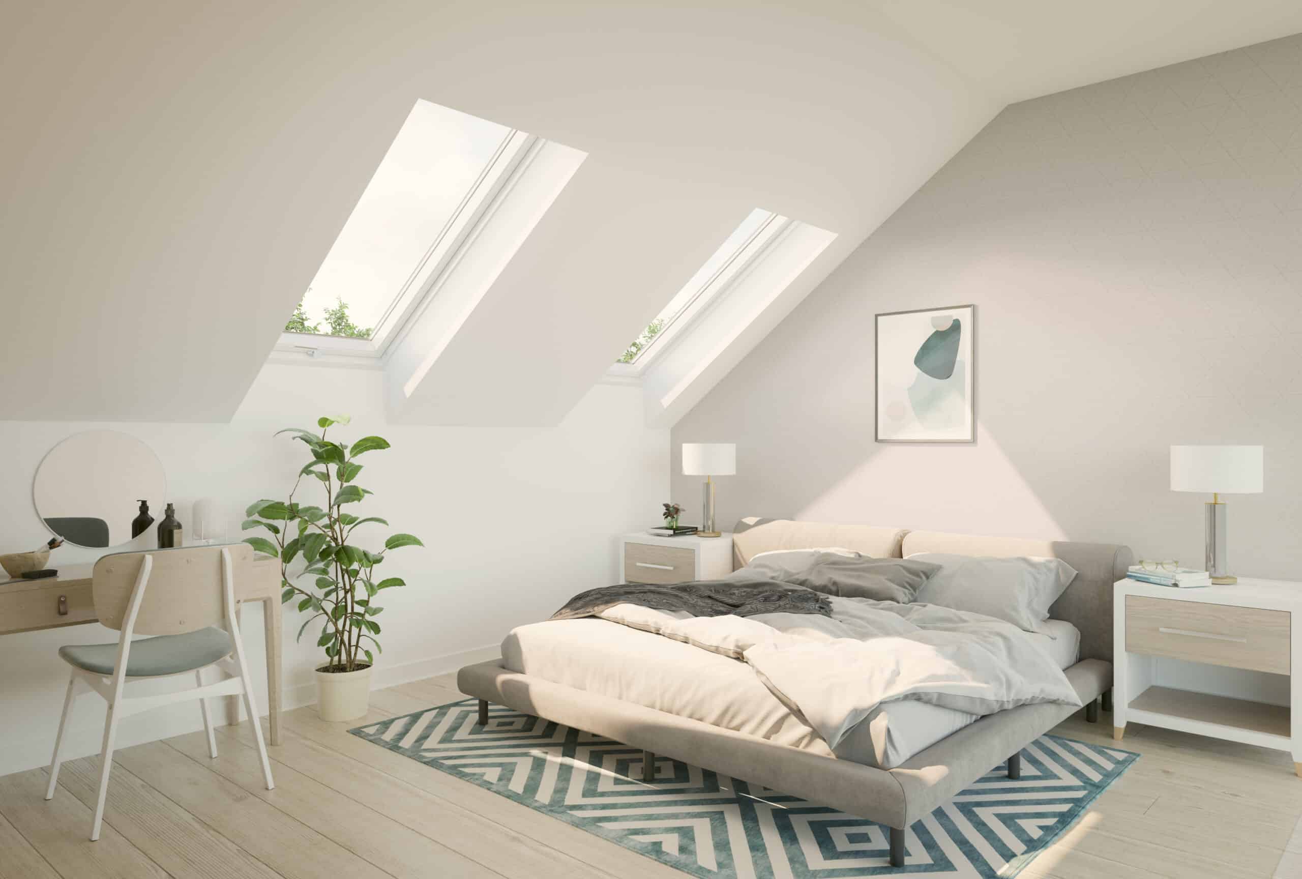 Chambre mansard&eacute;e avec plafond en pente et fen&ecirc;tres de toit VELUX, mobilier moderne.