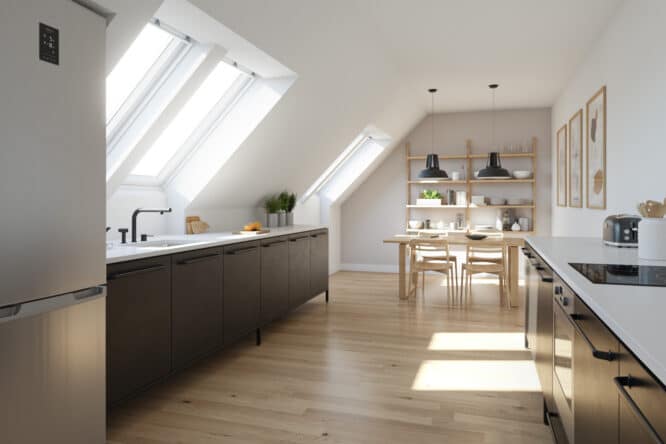 Cuisine mansardée avec plafond incliné et fenêtres de toit VELUX, design moderne.