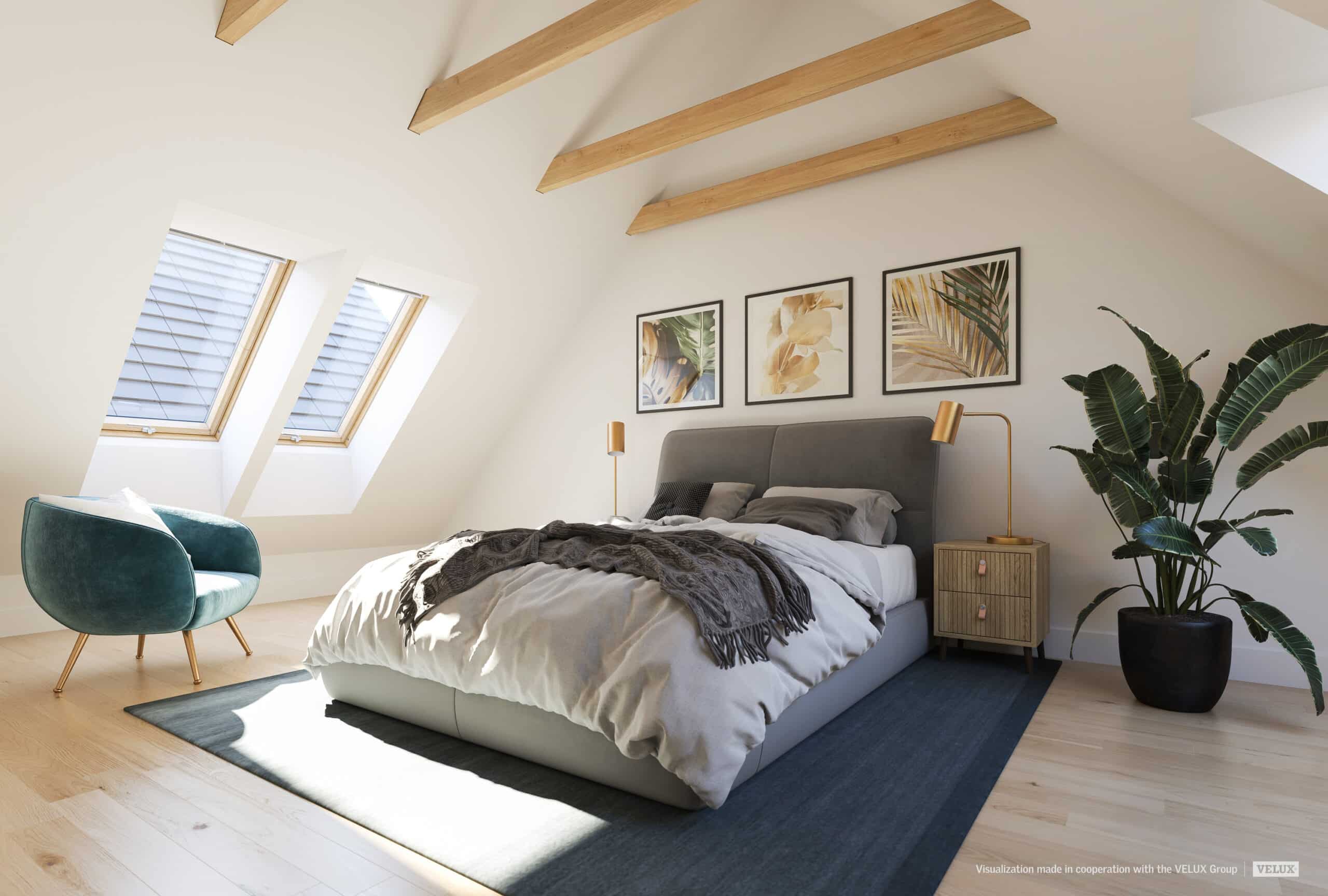 Chambre mansard&eacute;e avec lit contre mur pignon, poutres apparentes et fen&ecirc;tres de toit VELUX.