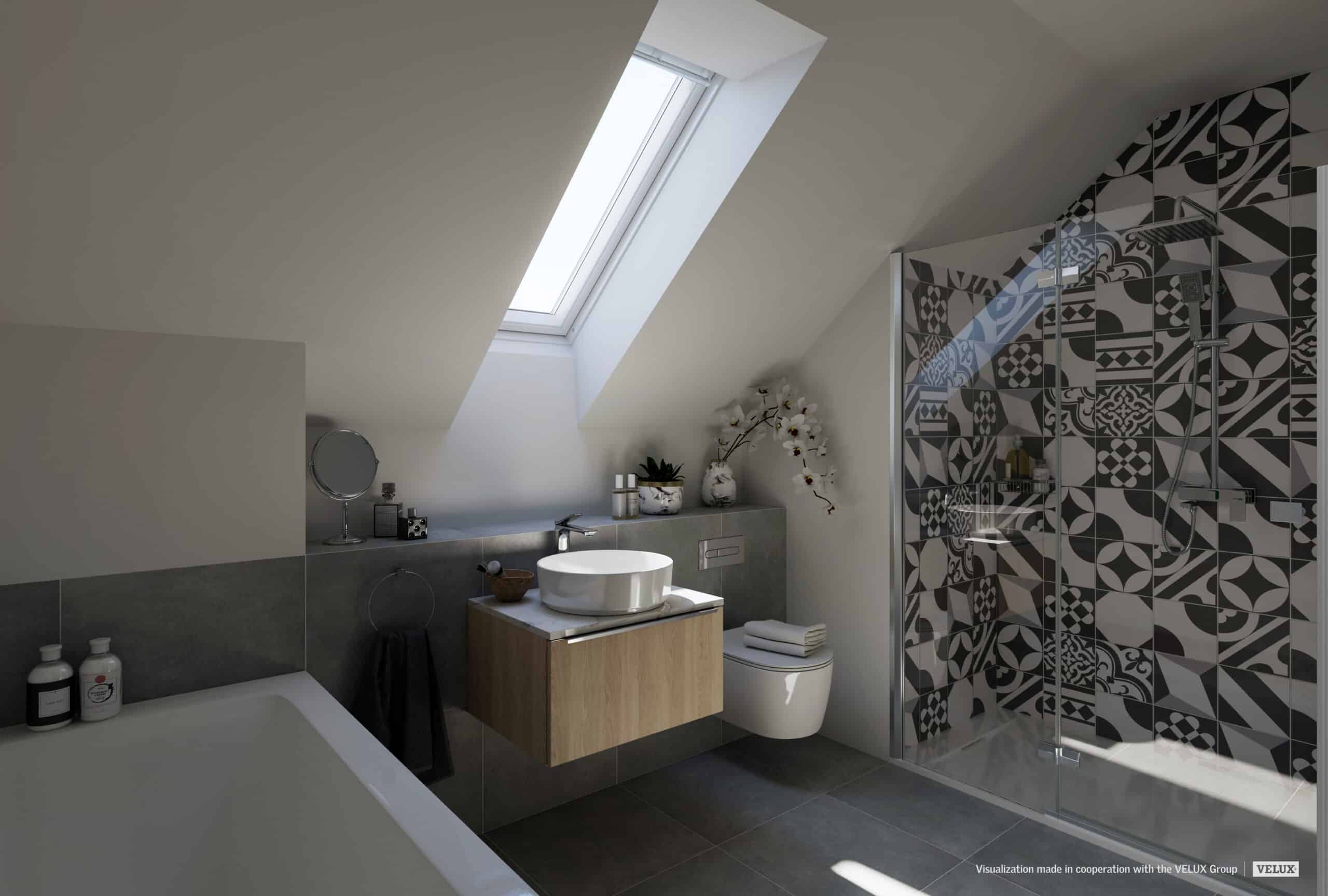 Salle de bains sous combles avec plafond en pente et fenêtre de toit VELUX, équipements modernes.