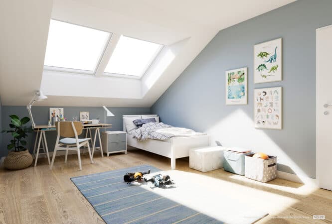 Chambre d'enfants mansardée avec plafond en pente et fenêtres de toit VELUX, décor lumineux et ludique.