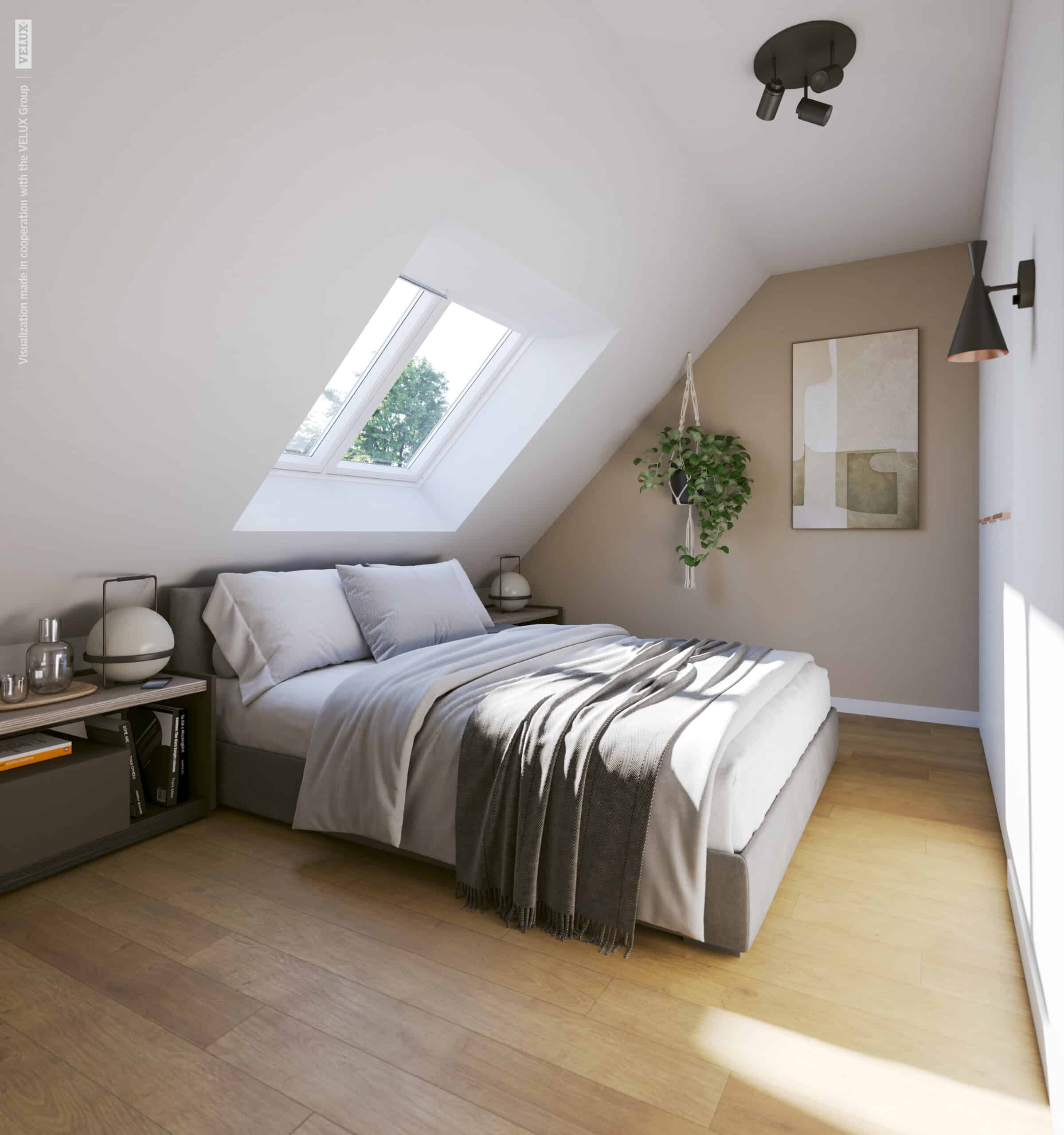 Chambre manssard&eacute;e sous les combles avec lit en bas de pente, fen&ecirc;tre de toit VELUX et d&eacute;coration minimaliste.