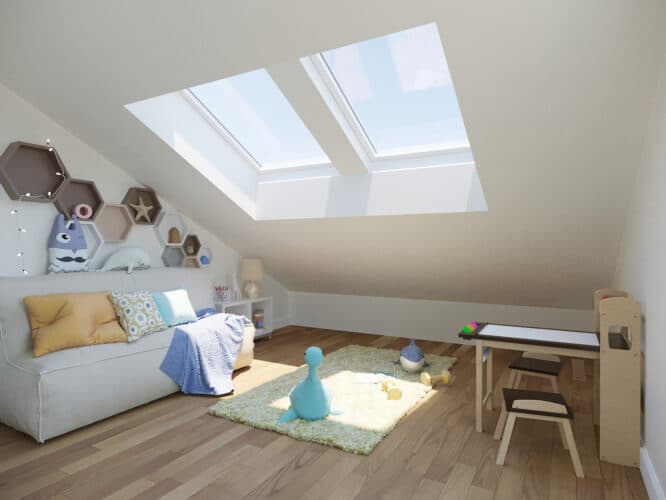 Chambre d'enfants mansardée avec plafond en pente et fenêtres de toit VELUX, décoration ludique.
