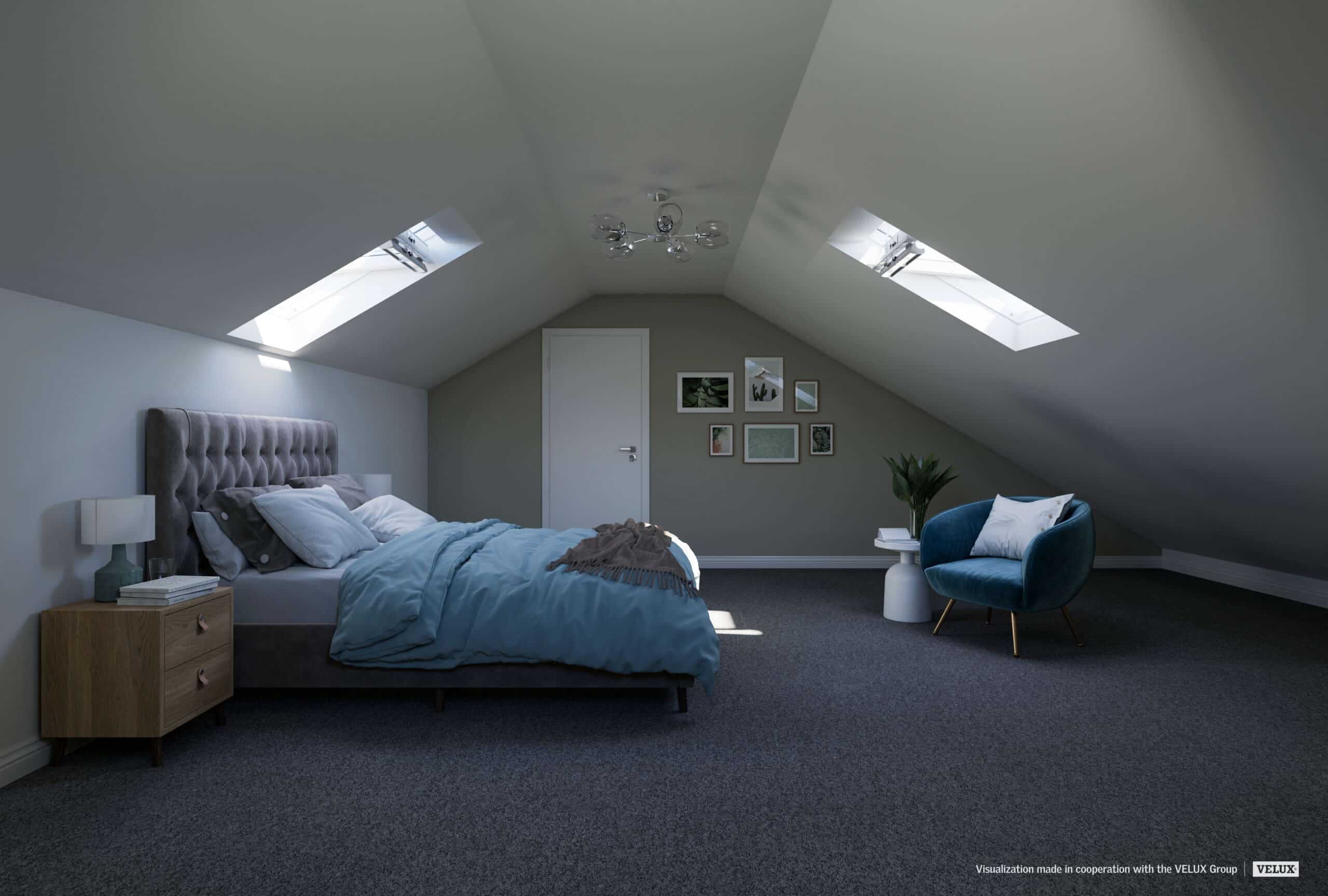 Chambre mansardée avec plafond en pente et fenêtres de toit VELUX, décoration chaleureuse.